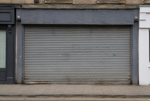 Serviceable roller shutter with a worn finish in Rugby