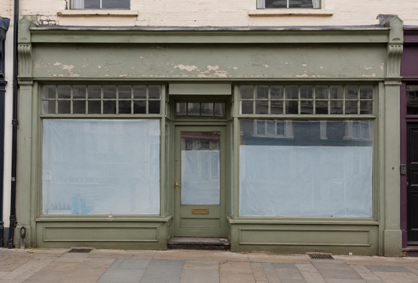 Existing shop front before refurbishment in Rugby