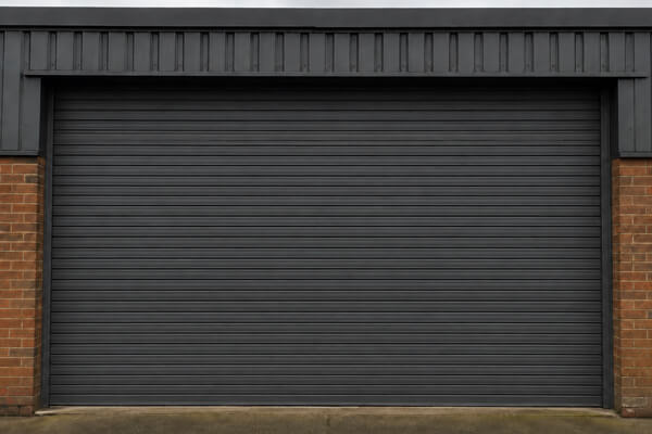 Commercial roller shutter door after repainting in Milton Keynes