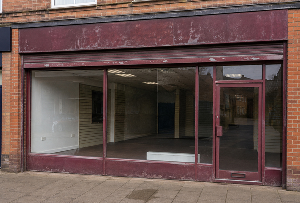 Aluminium commercial entrance before recoating in Winslow