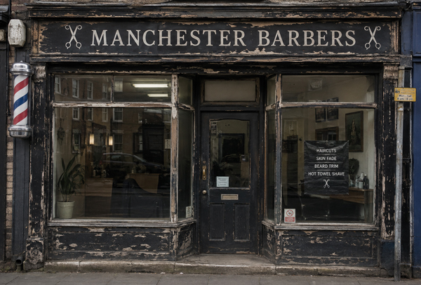 Commercial shop front before repainting in Milton Keynes