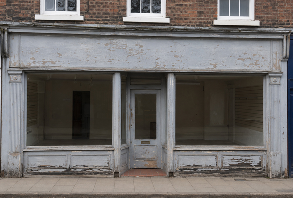 Timber shop front before painting in Milton Keynes